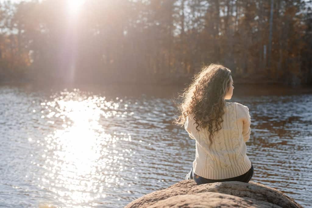 Woman on river waterfront